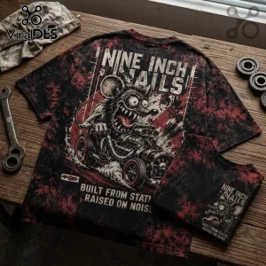 Nine Inch Nails graphic t-shirt in black and red acid wash featuring a cartoon rat driving a hot rod on a wooden table.!