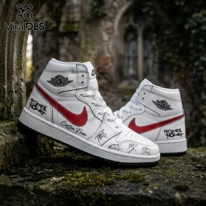 White high-top sneakers with red Nike swooshes, My Chemical Romance logos, and custom signature prints on stone ruins.!