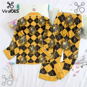 Hufflepuff Harry Potter pajama set with yellow and black argyle pattern and repeated house crests on white fabric.!