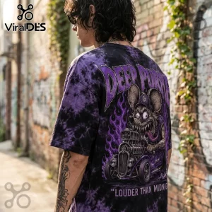 Person wearing a black and purple tie-dye t-shirt featuring a cartoon rat driving a hot rod with Deep Purple text graphic.!