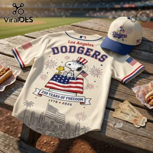 Los Angeles Dodgers baseball jersey and cap featuring Snoopy with US flag, fireworks, and 250 Years of Freedom 1776-2026.!