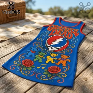 Blue sleeveless dress with Grateful Dead logo, dancing bears, red roses, and orange trim on a wooden deck background.!
