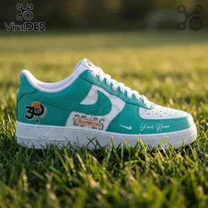 Custom turquoise and white leather sneaker with 30 seasons champion logo and Your Name script text on grass background.!