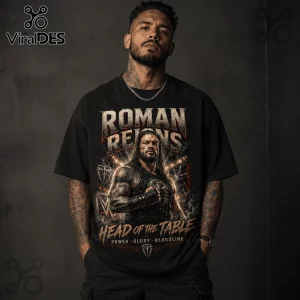 Black graphic t-shirt featuring Roman Reigns portrait, stadium background, and text reading Head of the Table, Power, Bloodline.!