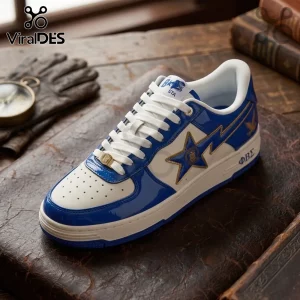 Blue and white patent leather sneaker featuring a gold star logo and Phi Beta Sigma Greek letters on a wooden table.!