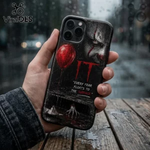 iPhone case featuring Pennywise the clown, a red balloon, and the text Every fear floats to the surface on dark background.!