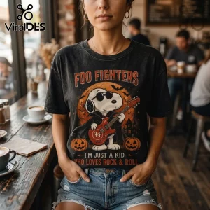 Foo Fighters x Snoopy Halloween Black T-Shirt featuring Snoopy playing a red guitar with pumpkins and a full moon backdrop.