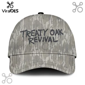 Baseball cap with grey and white tree bark camouflage pattern featuring Treaty Oak Revival text in black.!
