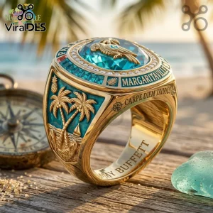 Jimmy Buffett Margaritaville gold parrot ring featuring a blue stone, palm tree engravings, and beach-themed details.