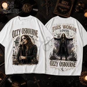 White graphic t-shirt featuring Ozzy Osbourne singing and standing, with gothic skulls, candles, and bats in vintage print.!