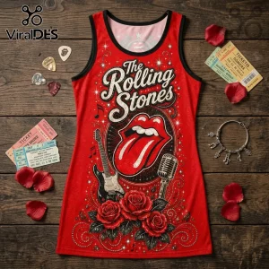 Red Rolling Stones tank top with tongue logo, electric guitar, microphone, and rose graphics on a wooden background.!