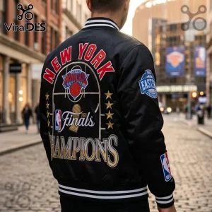 Black New York Knicks 2026 NBA Finals Champions satin varsity jacket with embroidered logos and stripes on a city street.!