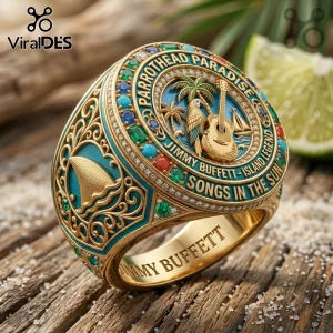 Jimmy Buffett Margaritaville Commemorative Engraved Ring with gold, blue enamel, and multi-colored gemstone accents.
