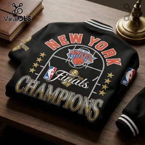 Black New York Knicks 2026 NBA Finals Champions varsity jacket with orange text, basketball court graphic, and gold trophy.!