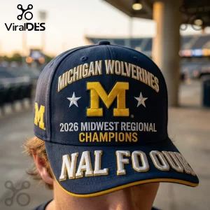 Navy blue Michigan Wolverines baseball cap with embroidered yellow M logo, white stars, and 2026 championship text.!