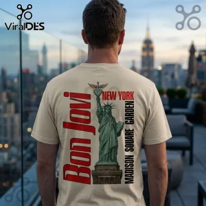 Cream-colored t-shirt featuring a back graphic of the Statue of Liberty holding a winged heart, with Bon Jovi text.!