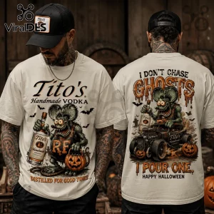 Tito's Vodka Rat Halloween Hot Rod T-Shirt featuring a cartoon rat driving a vintage car with pumpkins and vodka bottle.