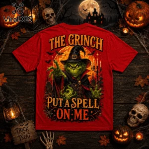 The Grinch Witch Hat Red Halloween T-Shirt featuring a green Grinch in a witch hat with magic flames and a full moon background.