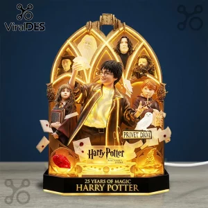 Harry Potter 25th Anniversary Sculpted LED Light Box featuring 3D figures of Harry, Hermione, and Ron with golden lighting.
