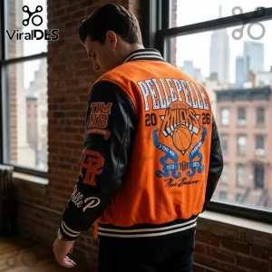 Man wearing an orange wool and black leather Pelle Pelle New York Knicks varsity jacket with championship embroidery.!