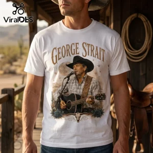 White crew neck t-shirt featuring a George Strait graphic print with a cowboy hat, guitar, moon, and desert elements.!