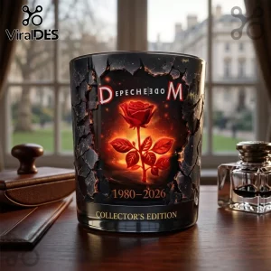 Black glass candle jar featuring a glowing red rose, Depeche Mode logo, and 1980-2026 text on a wooden desk.!