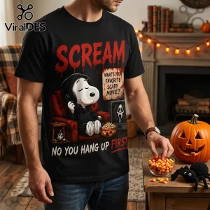 Snoopy x Scream Halloween Black T-Shirt 2026 featuring Snoopy in a ghost mask sitting in a red armchair with popcorn.
