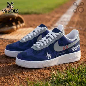 Los Angeles Dodgers x Kaws Air Force 1 Sneakers in blue camo with white laces and Kaws signature double-X branding.