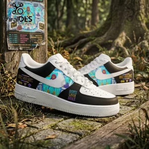 Custom white and black sneakers featuring Dance Gavin Dance band graphics on a stone path next to a concert poster.!