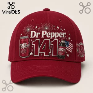 Dr Pepper 141st Anniversary Burgundy Baseball Cap featuring a soda can, bottle, fireworks, and American flag graphic.
