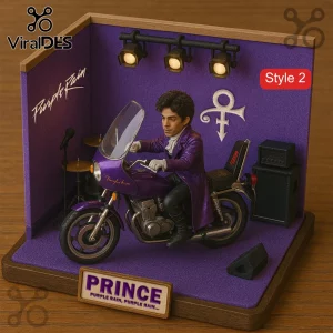 Prince Purple Rain Diorama Desktop Figurine featuring a miniature Prince on a motorcycle inside a purple-themed stage box.