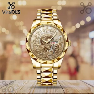 Gold-toned metal analog watch featuring an embossed Elvis Presley portrait, microphone, and text on a textured dial.!