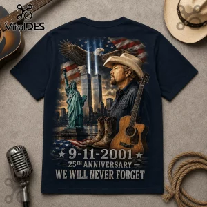 Toby Keith 9/11 25th Anniversary T-Shirt featuring a patriotic design with the Twin Towers, Statue of Liberty, and eagle.