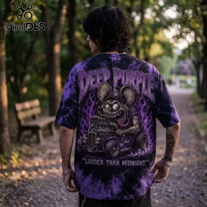 Person wearing a purple tie-dye t-shirt featuring a cartoon rat driving a hot rod with Deep Purple and flame graphics.!