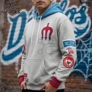 Diablos Rojos x Spider-Man Marvel Beige Hoodie featuring a red trident logo, blue hood, and baseball-themed sleeve patches.