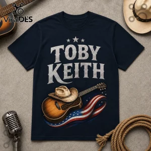 Toby Keith 9/11 25th Anniversary T-Shirt featuring a country music guitar, cowboy hat, and American flag graphic print.