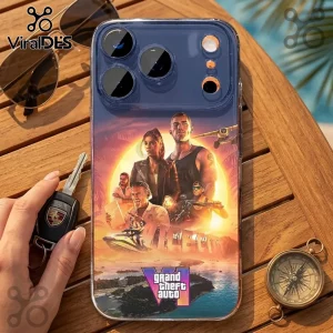 Grand Theft Auto VI Vice City Clear Phone Case 2026 featuring game characters and a tropical sunset on a wooden table.