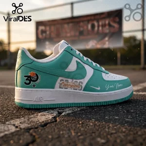 Custom turquoise and white leather low-top sneakers featuring a 30th anniversary basketball graphic and Champions text.!