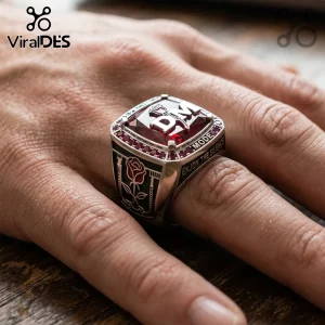 Depeche Mode tribute silver ring featuring a large red gem, rose engravings, and Enjoy the Silence text on the side.!