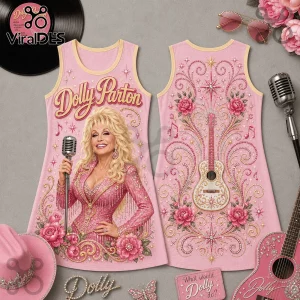 Pink sleeveless tank top featuring Dolly Parton illustration, microphone, acoustic guitar, floral motifs, and gold accents.!