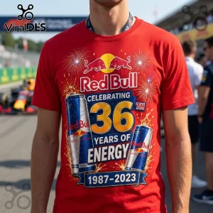 Red Bull 36 Years Anniversary Red T-Shirt featuring a graphic with two energy drink cans, fireworks, and text 1987-2023.