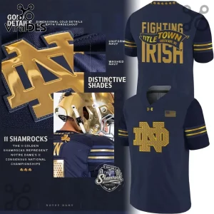 Navy Notre Dame Shamrock Series jersey with metallic gold lettering, sleeve stripes, and eleven shamrock collar accents.!