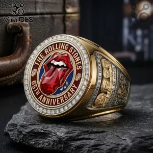 Gold championship ring featuring The Rolling Stones red tongue logo, 65th anniversary text, and band member relief carvings.!