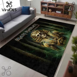 Iron Maiden Powerslave Egyptian Mummy area rug featuring Eddie the Head in a golden sarcophagus on a dark green background.