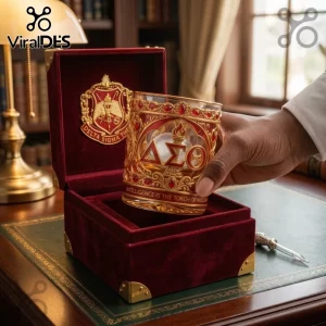 Delta Sigma Theta branded whiskey glass with gold metal filigree, red jewels, and a matching velvet display box.!