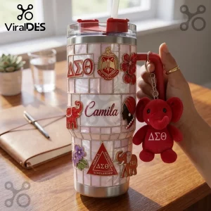 Customized Delta Sigma Theta tumbler with pink tile pattern, Greek letters, elephant charms, and name Camila printed.!