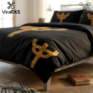 Black duvet cover and pillowcases featuring large, textured gold symbols on a bed in a rustic wooden bedroom.!