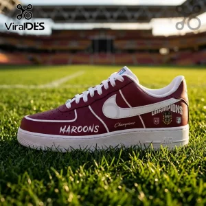 Maroon and white leather sneaker featuring Maroons text, Champion branding, and a stadium grass background.!