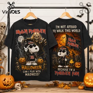 Snoopy x Iron Maiden Halloween Black T-Shirt featuring Snoopy in a leather jacket with Eddie on a dark graveyard backdrop.
