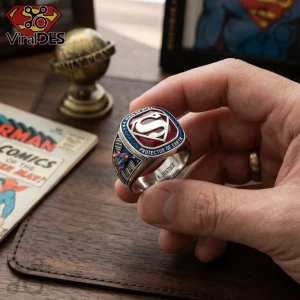 Superman Protector of Earth Engraved Ring with red and blue enamel, silver finish, and Metropolis skyscraper details.
